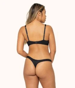 The Ribbed Thong: Jet Black -Cheap Lingerie Store 3 on model back ribbed thong jet black 99ae855e 7f45 4bfd a455 657365f22052