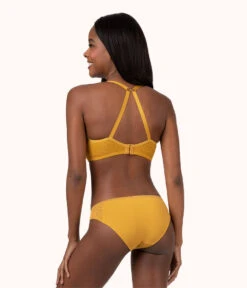 The Unlined Lace Bra: Turmeric -Cheap Lingerie Store 4 on model back1 unlined lace bra turmeric